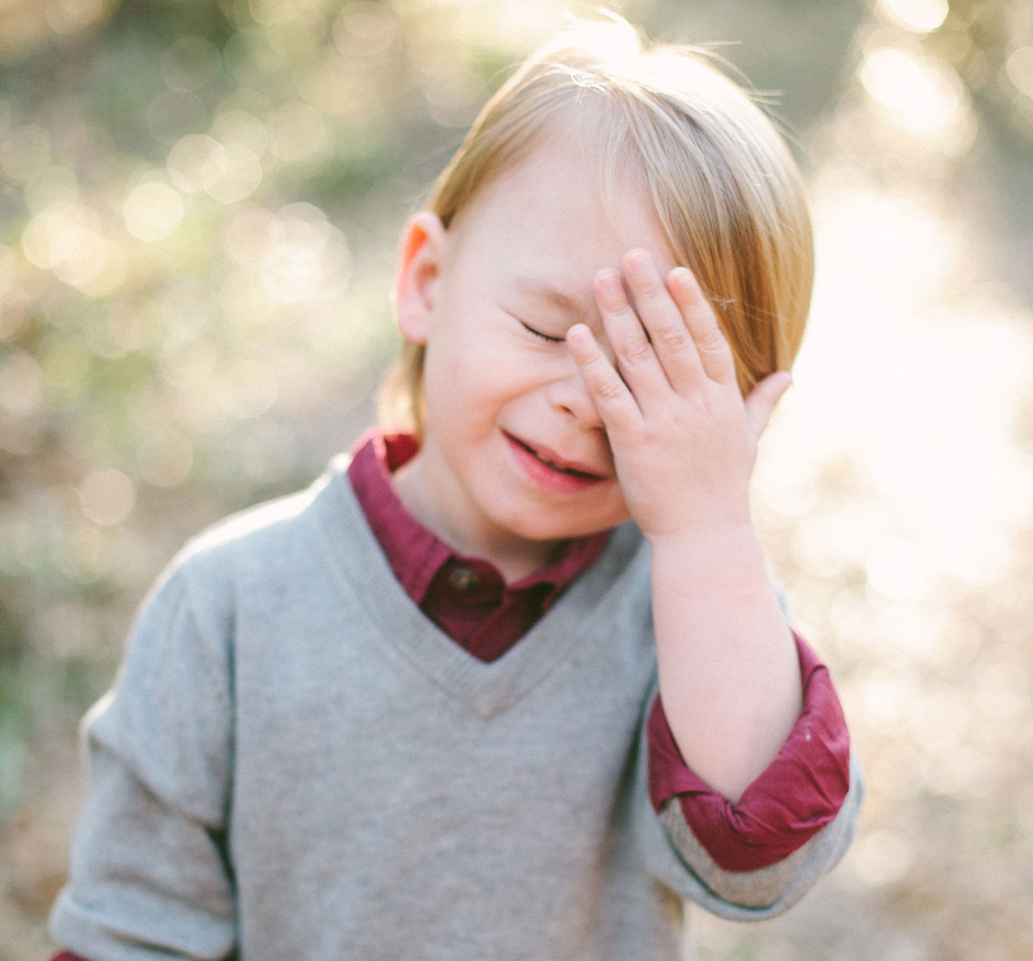 Photo of my son at 3.5 years old with his palm to his face in embarrassment